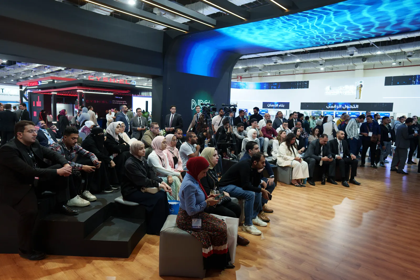 An audience at a session on the Central Bank of Egypt stand, PAFIX 2025