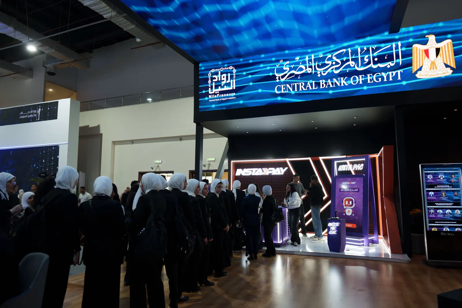 Visitors lining up at the Central Bank of Egypt stand, PAFIX 2025
