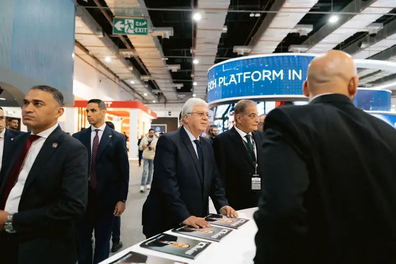 A briefing at a fintech pavilion during the PAFIX 2025 opening tour